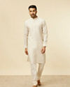 alt message - Manyavar Men Warm White Self Patterned Kurta image number 2