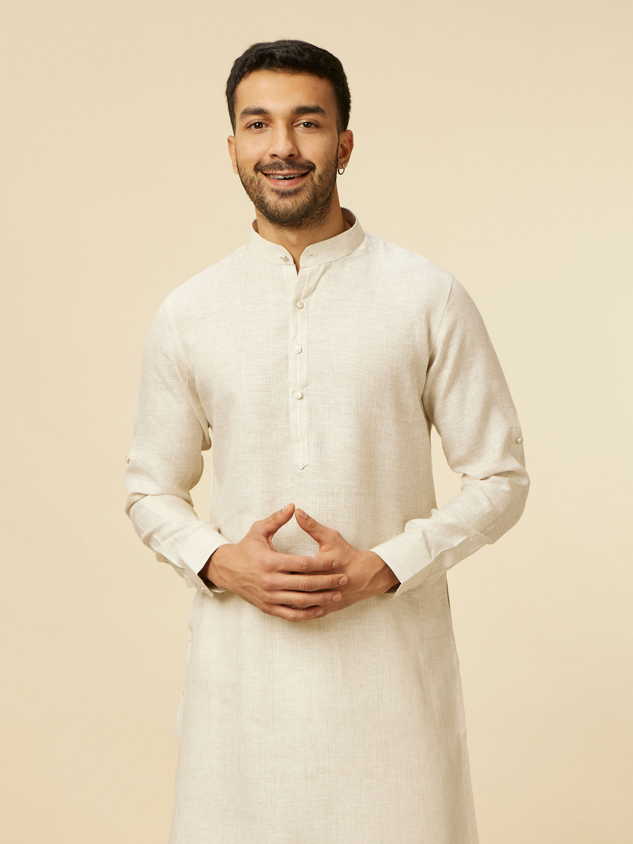 alt message - Manyavar Men Warm White Self Patterned Kurta image number 0