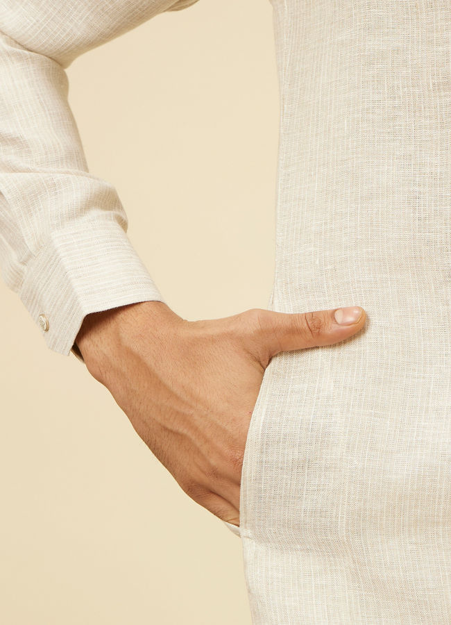 Manyavar Men Warm White Self Patterned Kurta