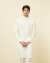 alt message - Manyavar Men Warm White Square Grid Printed Kurta image number 0