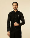 alt message - Manyavar Men Black Striped Patterned Kurta image number 0