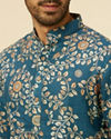 alt message - Manyavar Men Teal Blue Bel Buti Patterned Kurta image number 1