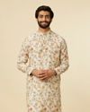 alt message - Manyavar Men Beige Bel Buti Patterned Kurta image number 0