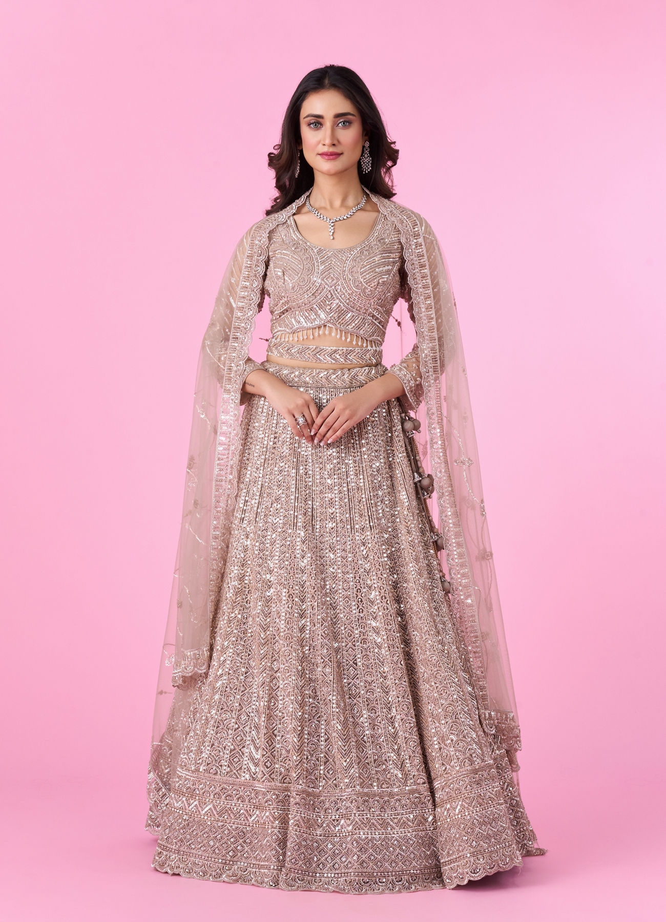 Mohey Women Glamourous Fawn Net Bridal Lehenga