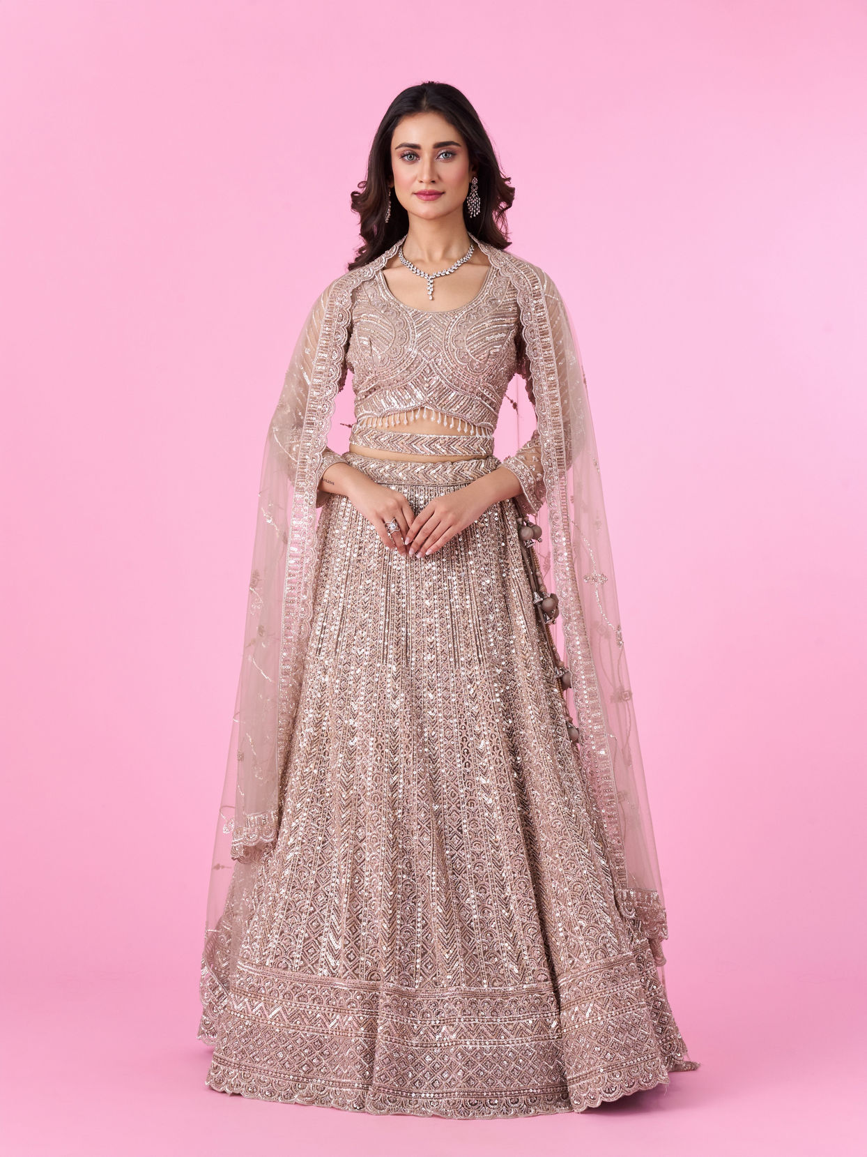 Mohey Women Glamourous Fawn Net Bridal Lehenga