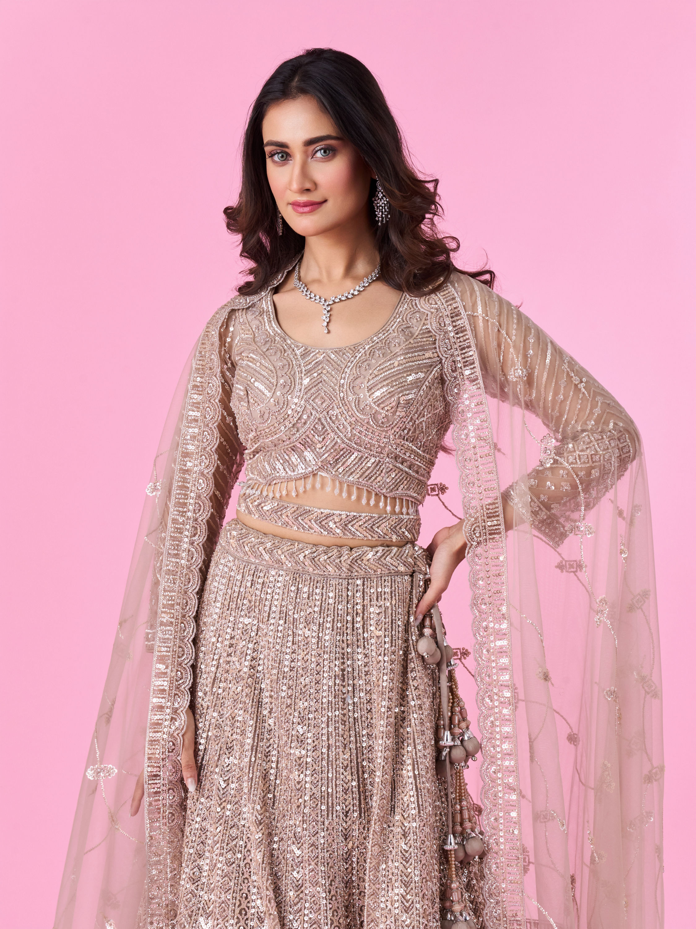 Mohey Women Glamourous Fawn Net Bridal Lehenga