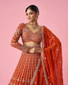 Mohey Women Orange Art Silk Bridal Lehenga with Sequin Work