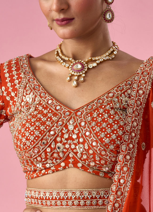 Mohey Women Orange Art Silk Bridal Lehenga with Sequin Work