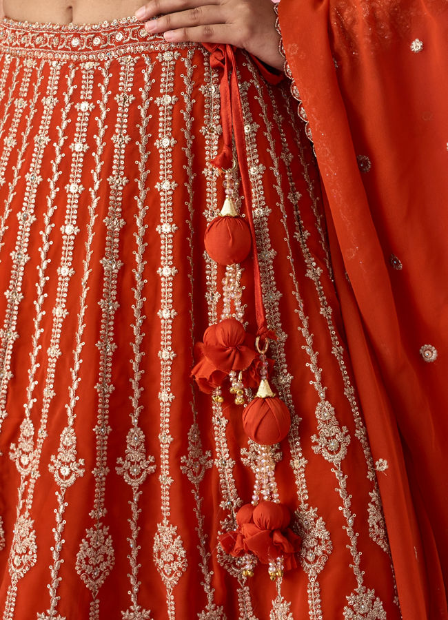 Mohey Women Orange Art Silk Bridal Lehenga with Sequin Work