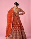 Mohey Women Orange Art Silk Bridal Lehenga with Sequin Work