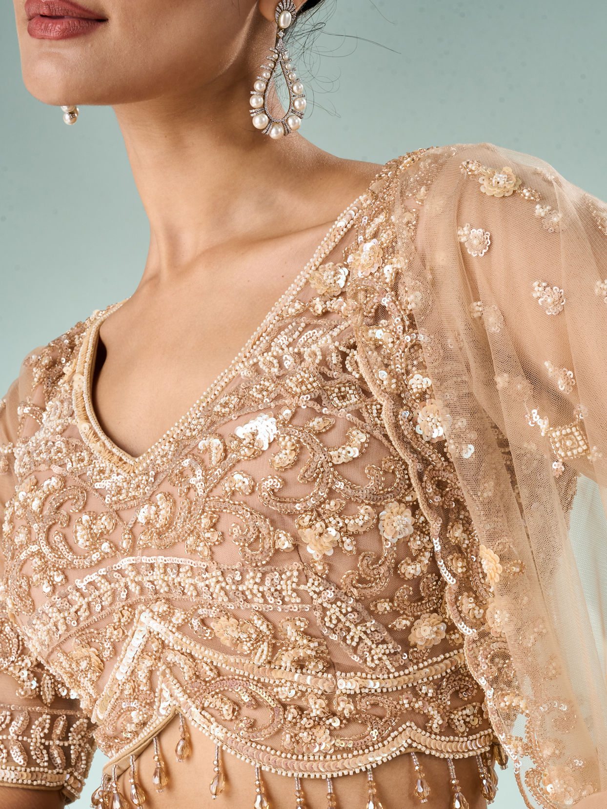 Mohey Women Beige Net Lehenga with Sequin Work