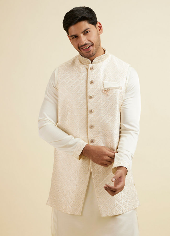 alt message - Manyavar Men Cream Self Patterned Jacket Set image number 0