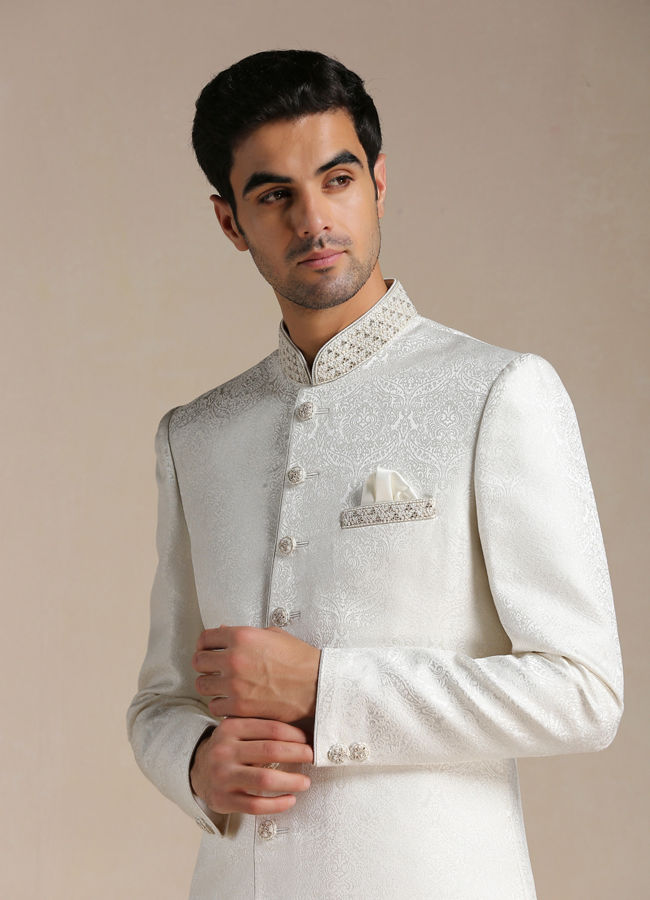 alt message - Manyavar Men Off White Medallion Patterened Brocade Indo Western Set image number 0