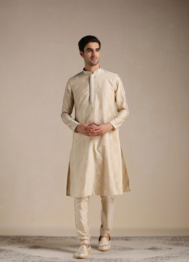 alt message - Manyavar Men Rose Beige Motif Kurta Set image number 1