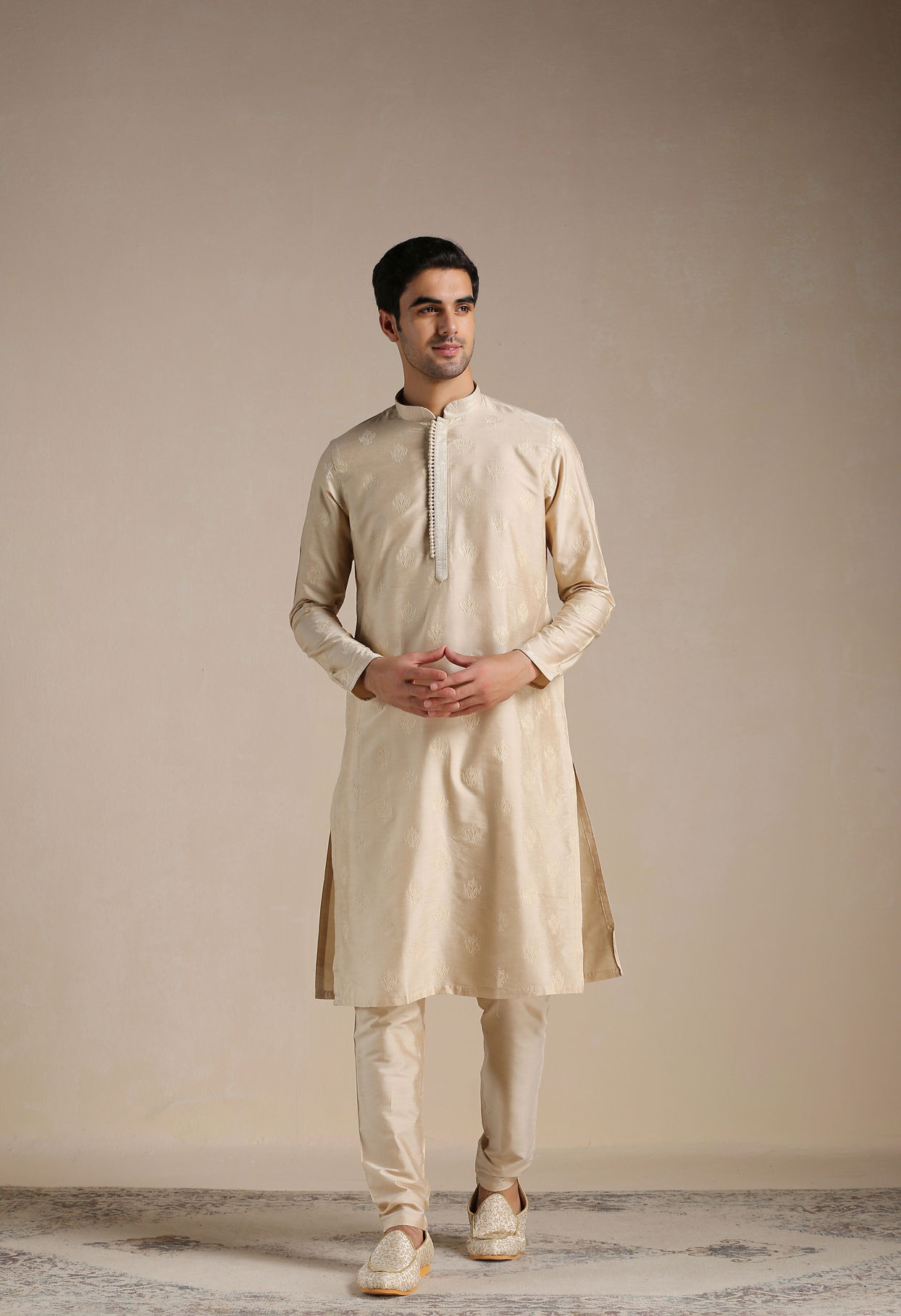 alt message - Manyavar Men Rose Beige Motif Kurta Set image number 1