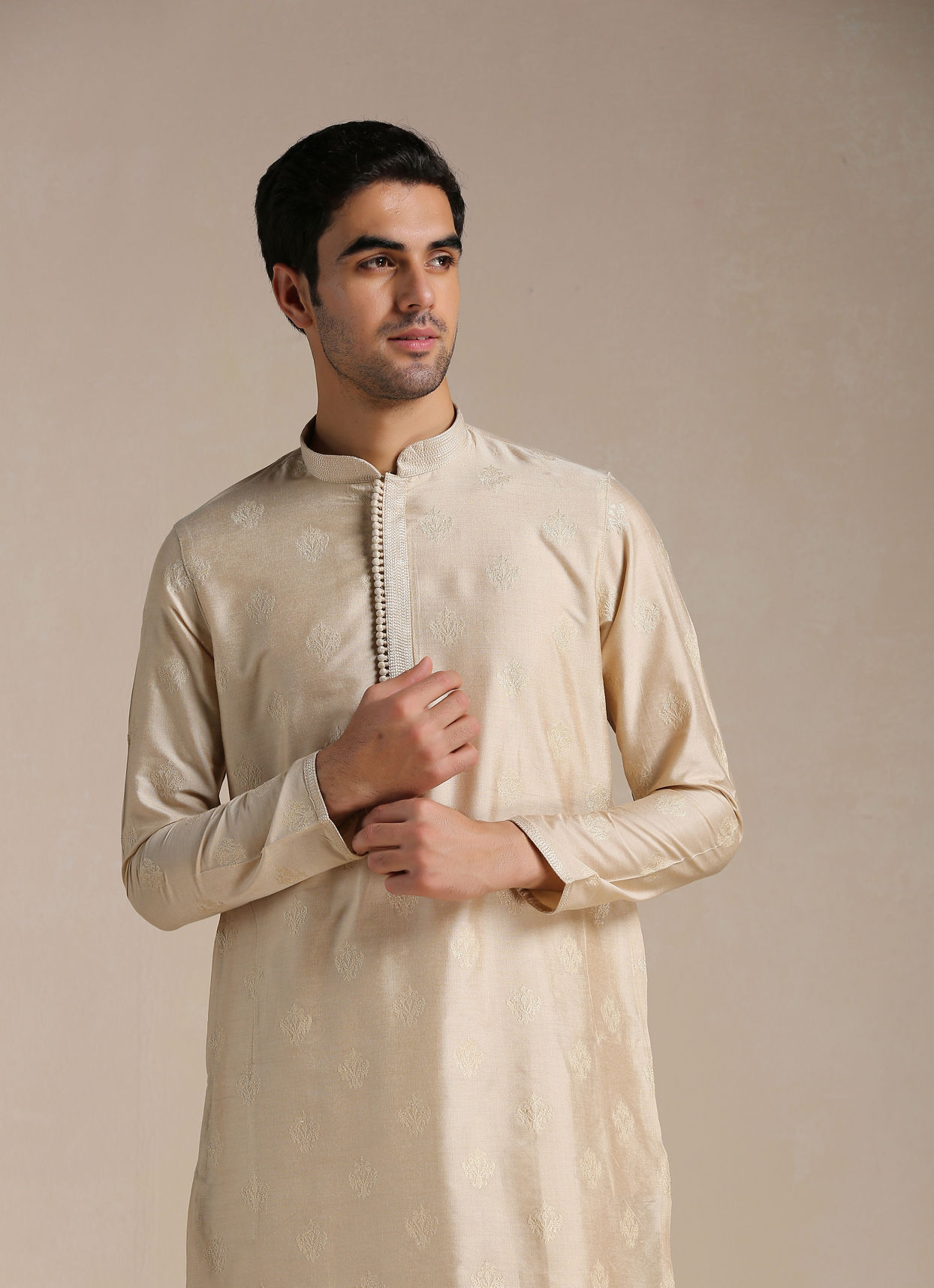 alt message - Manyavar Men Rose Beige Motif Kurta Set image number 0