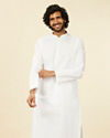 alt message - Manyavar Men Ivory White Plain Kurta Set image number 0