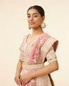 alt message - Mohey Women Dark Cream Sequinned Floral Embroidered Bridal Lehenga image number 1