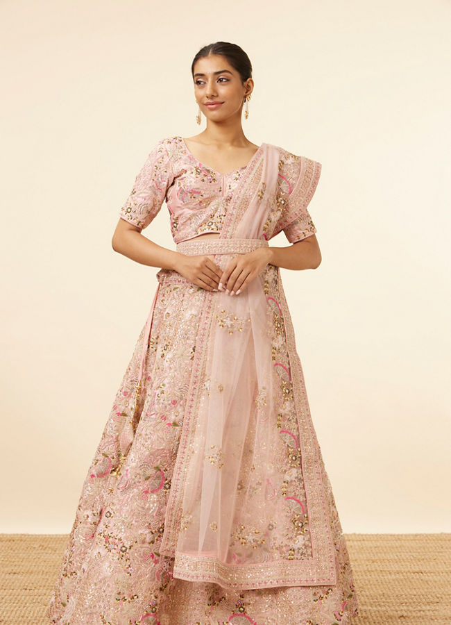 alt message - Mohey Women Light Pink Sequined Floral Bridal Lehenga image number 0