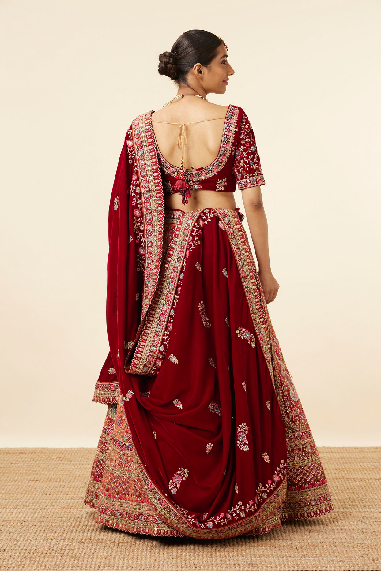 alt message - Mohey Women Mustard Red Embroidered Bridal Lehenga image number 3