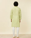 alt message - Manyavar Men Light Green Solid Kurta Set image number 8