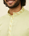 alt message - Manyavar Men Light Green Solid Kurta Set image number 2