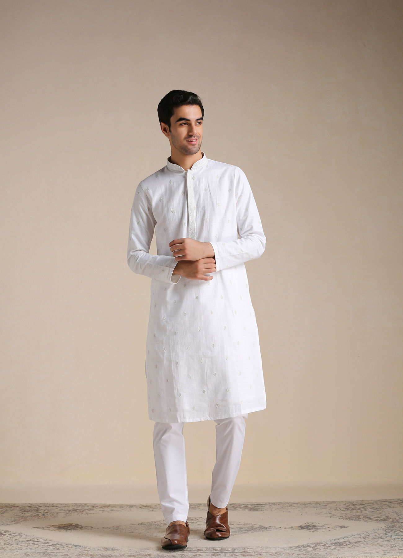 Manyavar Men Off-white Self Motif Kurta Set