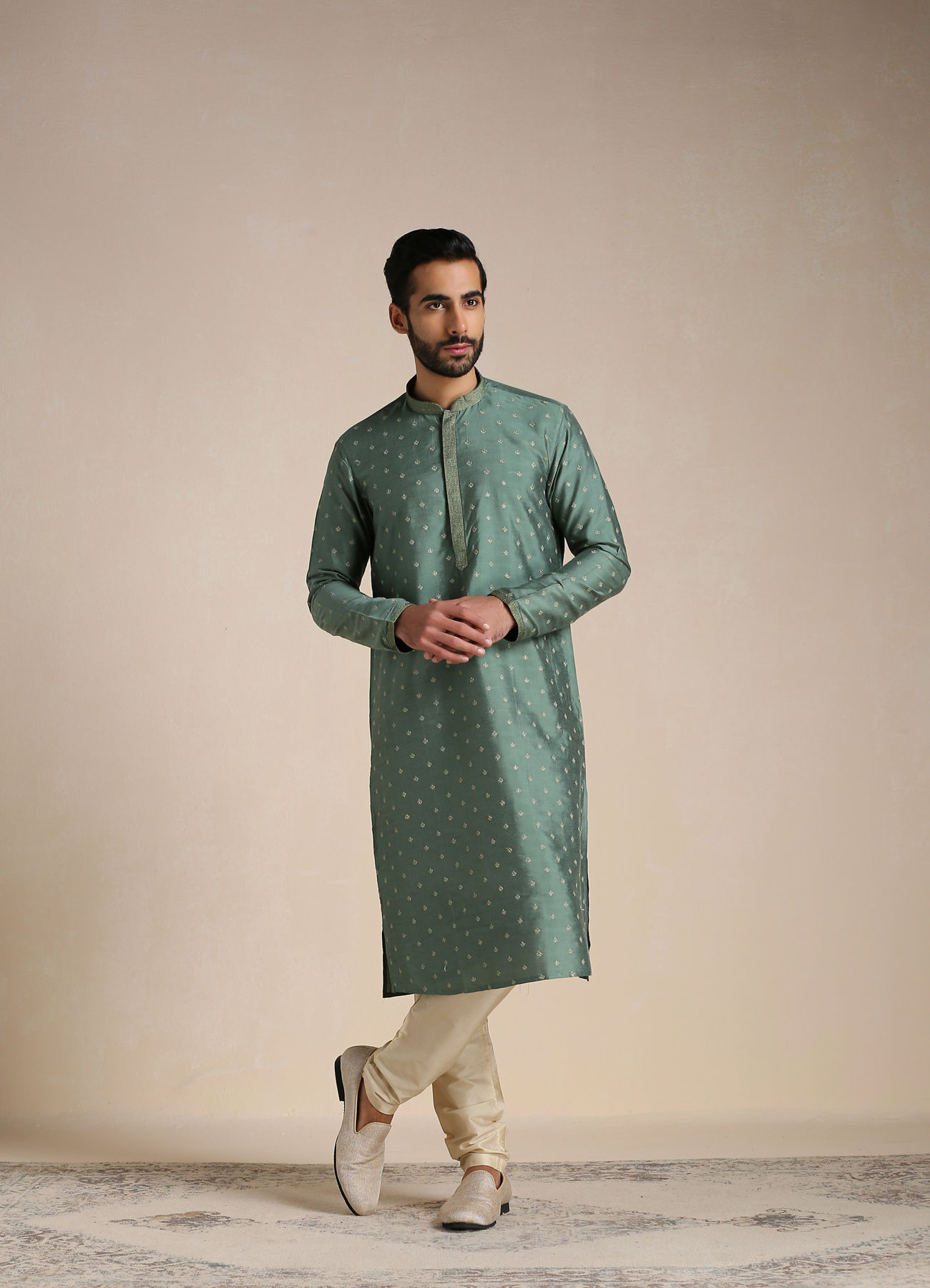 Manyavar Men Hunter Green Self Motif Kurta Set