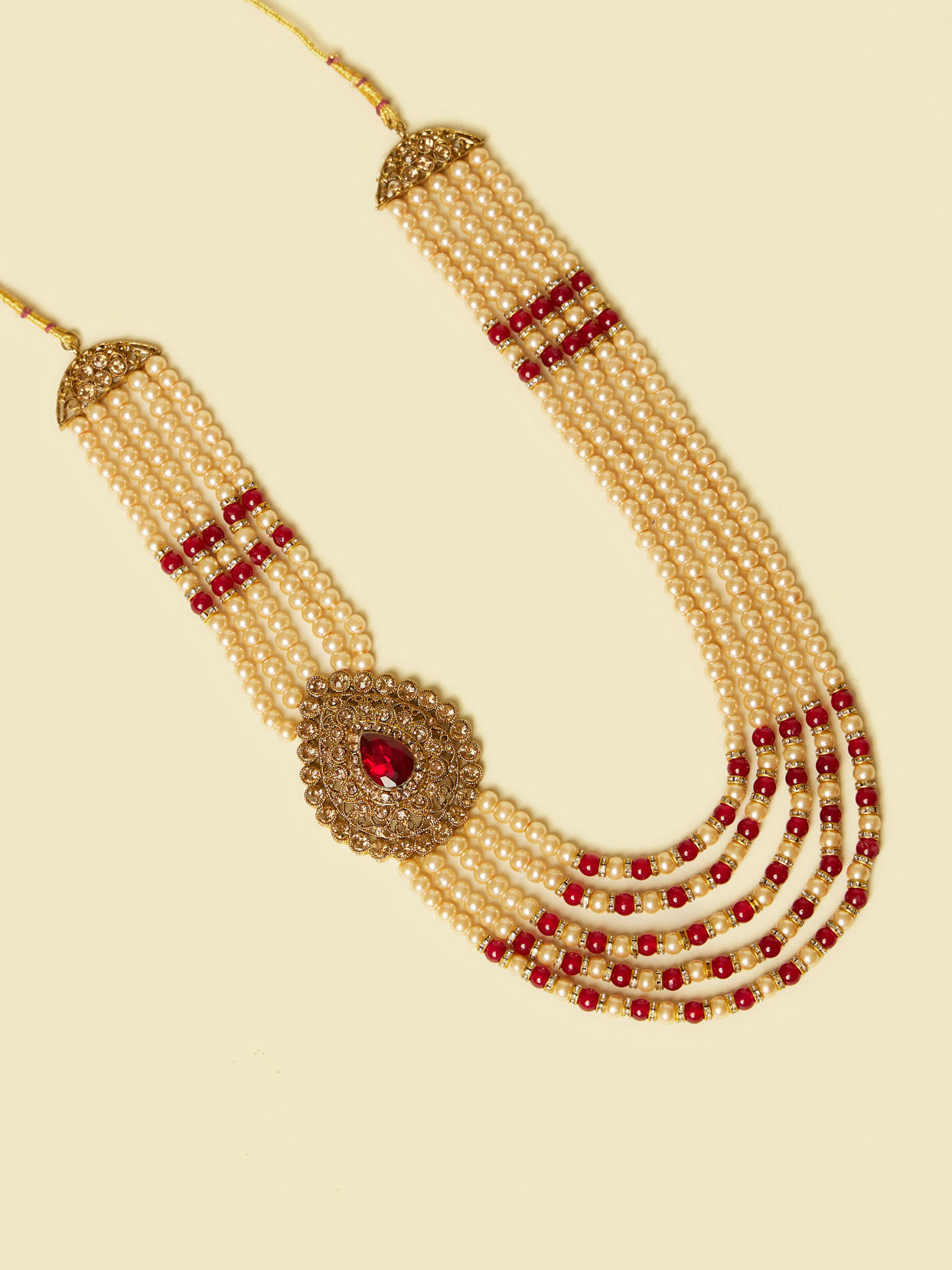 alt message - Manyavar Men Cream and Maroon Pearl Layered Mala with Pendant image number 0