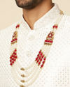 alt message - Manyavar Men Pearl and Maroon Stone Brooch Mala image number 2