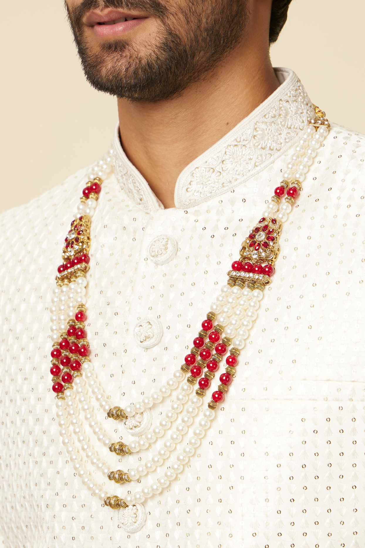 alt message - Manyavar Men Pearl and Maroon Stone Brooch Mala image number 2