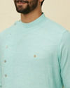 alt message - Manyavar Men Pastel Turquoise Green Angrakha Style Kurta image number 1