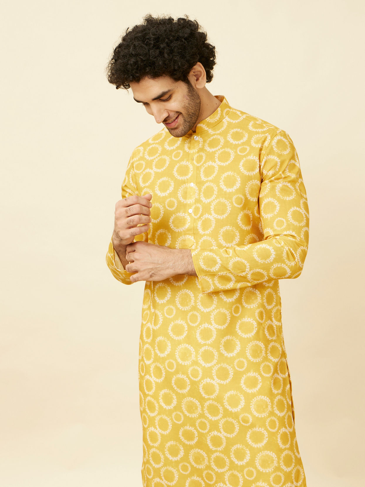 alt message - Manyavar Men Sunrise Orange Circular Printed Kurta image number 0