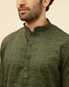 alt message - Manyavar Men Dark Green Linear Printed Kurta image number 1