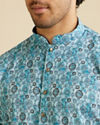 alt message - Manyavar Men Turquoise Blue Jaal Patterned Kurta image number 1