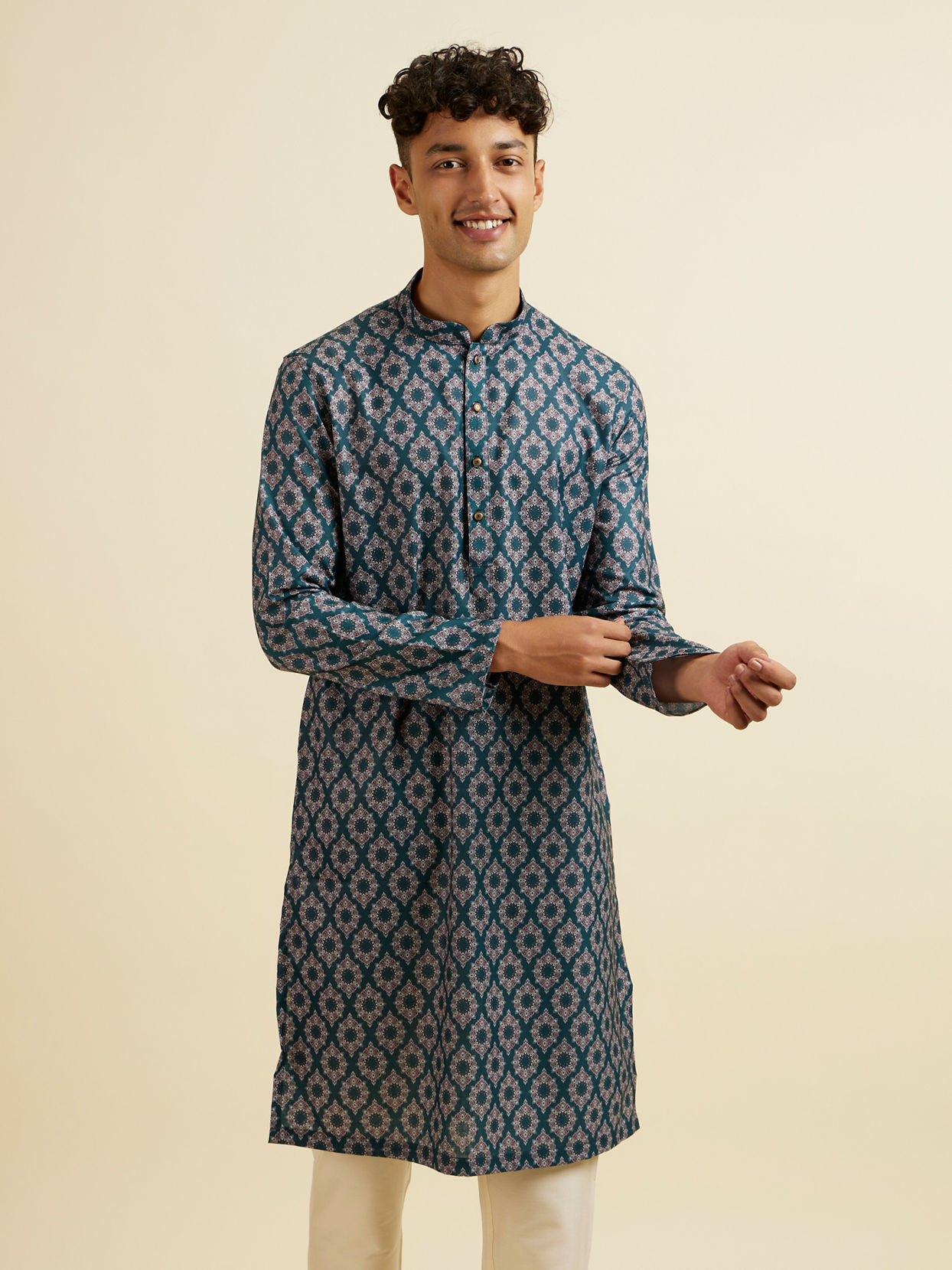 alt message - Manyavar Men Teal Green Jaal and Medallion Patterned Kurta image number 0