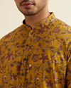 alt message - Manyavar Men Mustard Yellow Bel Buti Printed Kurta image number 1