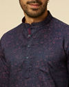 alt message - Manyavar Men Dark Blue Ditsy Floral Printed Short Kurta image number 1