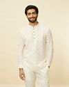 alt message - Manyavar Men Star White Shankh Printed Short Kurta image number 0