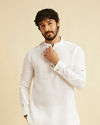 alt message - Manyavar Men Warm White Classic Short Kurta image number 0