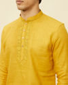 alt message - Manyavar Men Mustard Yellow Embroidered Neckline Short Kurta image number 2