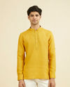 Mustard Yellow Embroidered Neckline Short Kurta