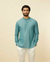 alt message - Manyavar Men Teal Green Grid Patterned Short Kurta image number 0