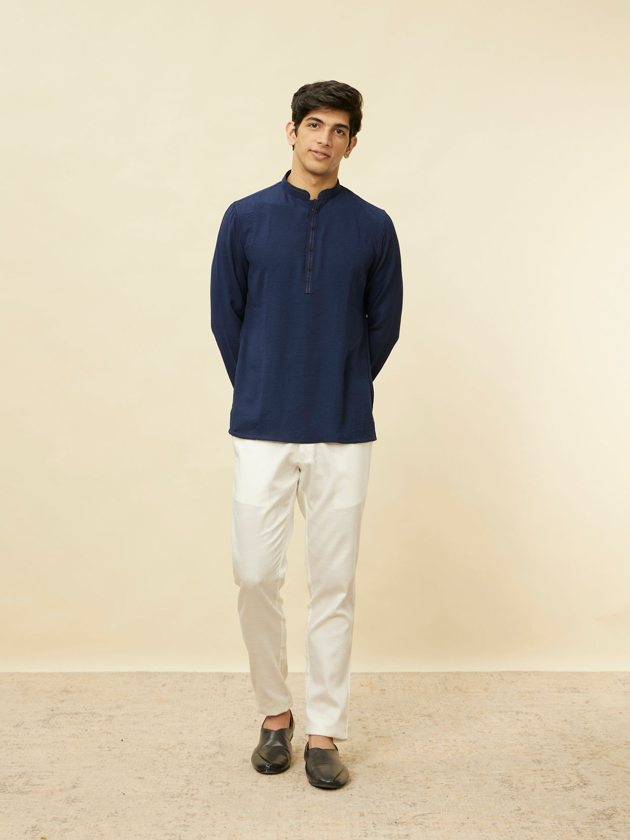 alt message - Manyavar Men Navy Blue Embroidered Neckline Short Kurta image number 2