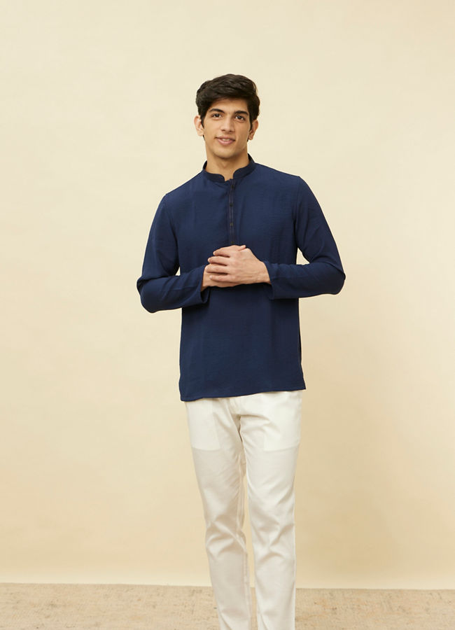 alt message - Manyavar Men Navy Blue Embroidered Neckline Short Kurta image number 0