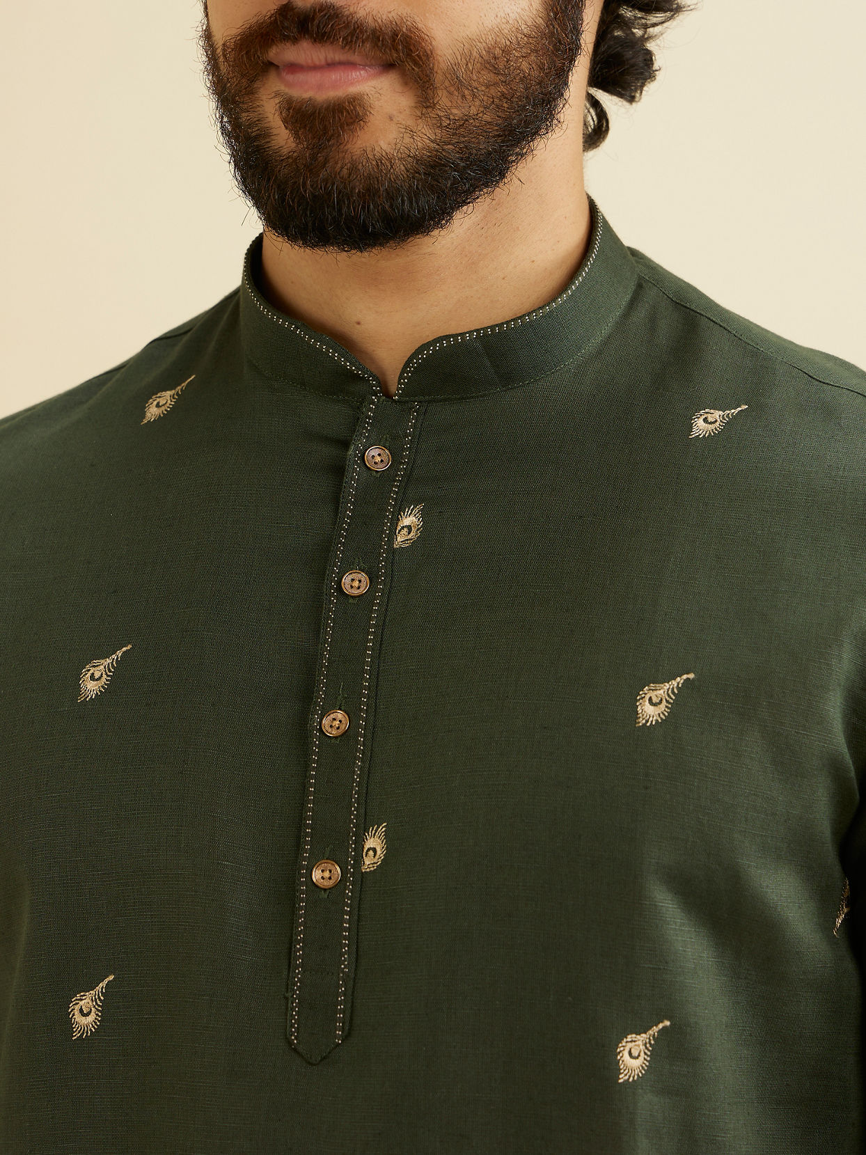 alt message - Manyavar Men Dark Green Embroidered Short Kurta image number 1