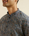 alt message - Manyavar Men Dark Blue Kaleidoscopic Print Short Kurta image number 1