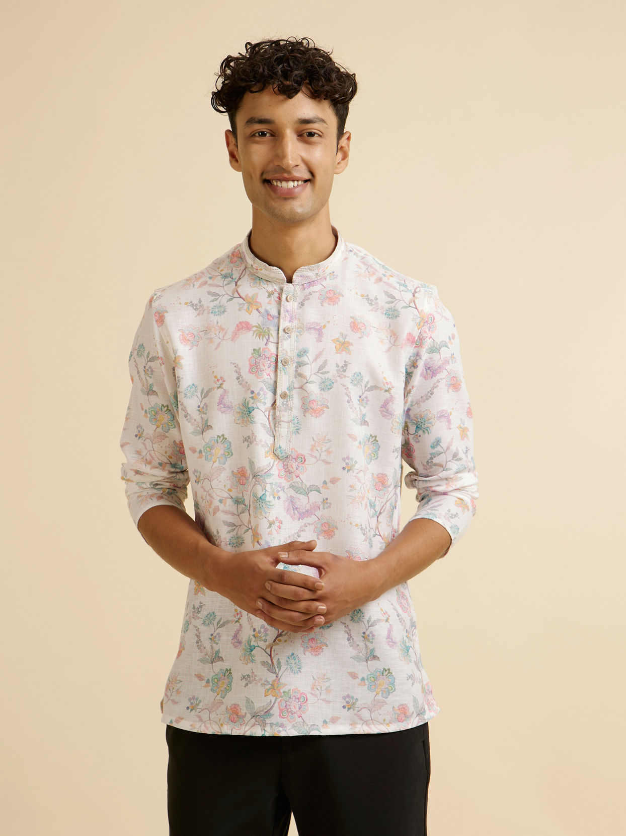 alt message - Manyavar Men Warm White Floral Print Short Kurta image number 0