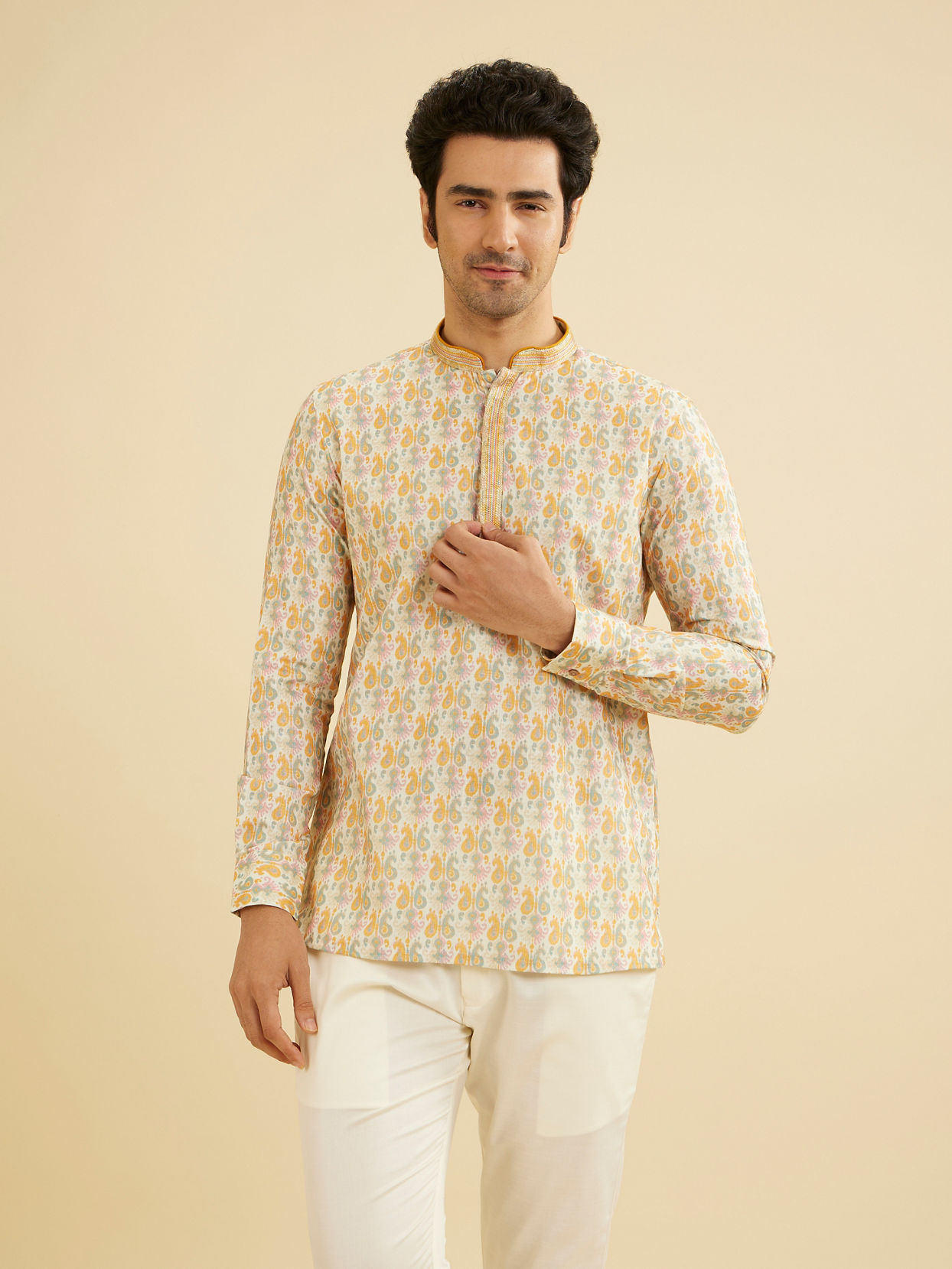 Manyavar Men Soft Beige Paisley Printed Short Kurta with Striped Neckline image number 0