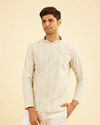 Manyavar Men Pista Green Paisley Embroidered Short Kurta with Sequin Work